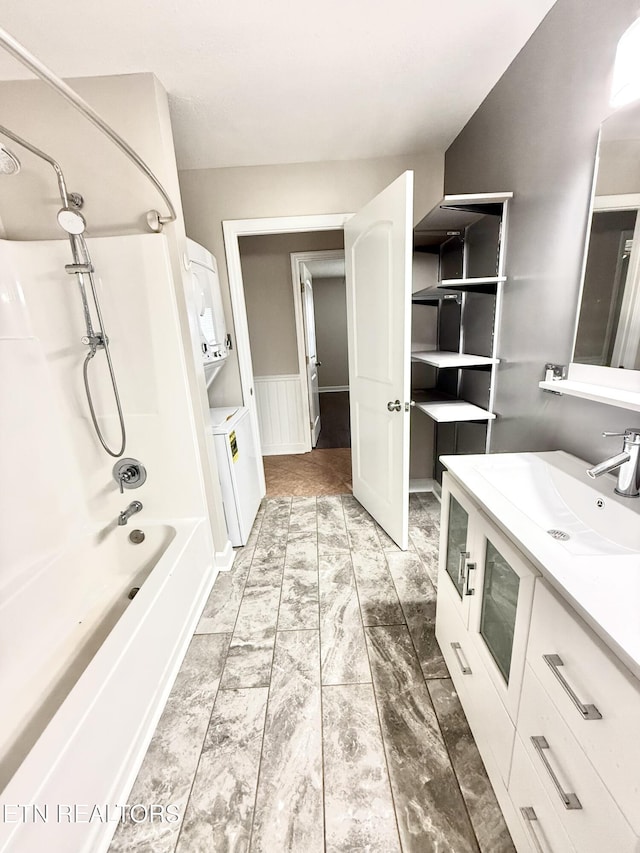 304 Douglas Ave, Knoxville, TN 37921 - bathroom featuring vanity, shower / washtub combination, a wainscoted wall, and marble finish floors