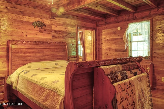 147 Akers Chapel, Jamestown, TN 38556 - bedroom with wooden ceiling with exposed beams, wood finished floors, and wood walls