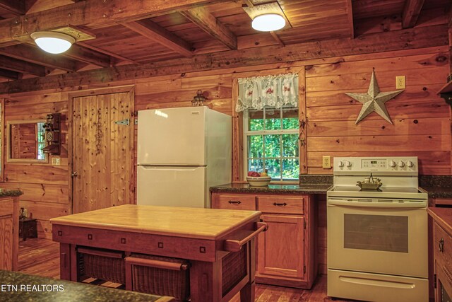 147 Akers Chapel, Jamestown, TN 38556 - kitchen with white appliances, wooden ceiling with exposed beams, wooden walls, wood finished floors, and dark countertops