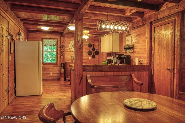 147 Akers Chapel, Jamestown, TN 38556 - dining area featuring wood ceiling with exposed beams, wood finished floors, wood walls, and ceiling fan