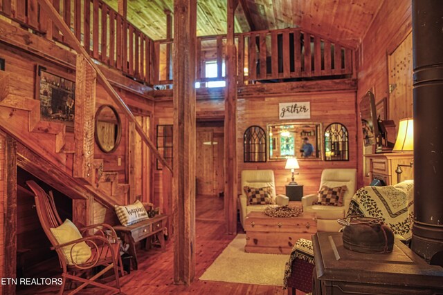 147 Akers Chapel, Jamestown, TN 38556 - living area featuring wood walls, stairs, wood-type flooring, high vaulted ceiling, and wood ceiling