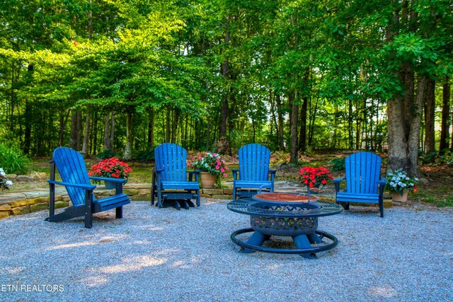 147 Akers Chapel, Jamestown, TN 38556 - view of patio / terrace with a fire pit