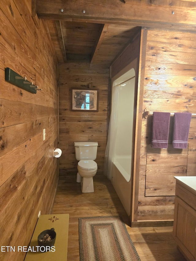 147 Akers Chapel, Jamestown, TN 38556 - bathroom with wood ceiling with exposed beams, wooden walls, toilet, wood finished floors, and vanity