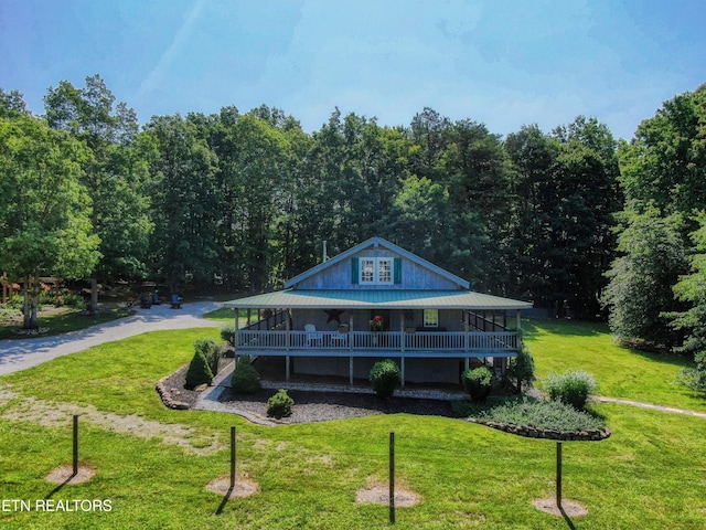 147 Akers Chapel, Jamestown, TN 38556 - view of front of house with a front lawn and a wooded view