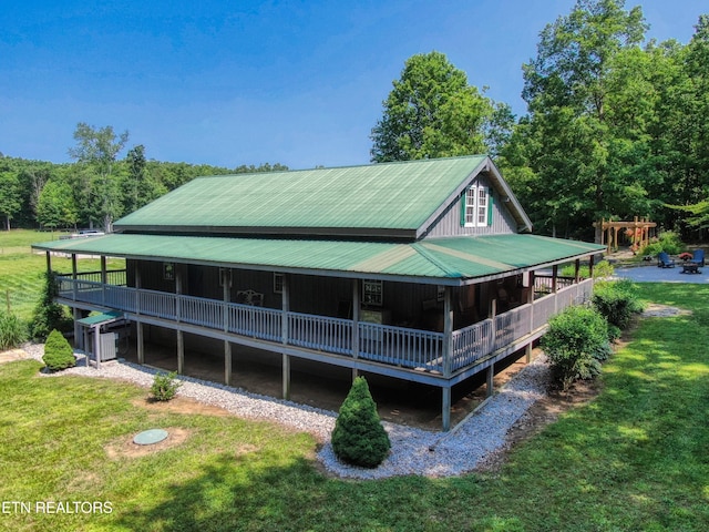 147 Akers Chapel, Jamestown, TN 38556 - rear view of house featuring a lawn and metal roof
