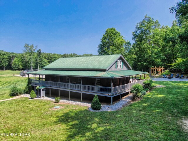 147 Akers Chapel, Jamestown, TN 38556 - view of side of property featuring a yard and metal roof