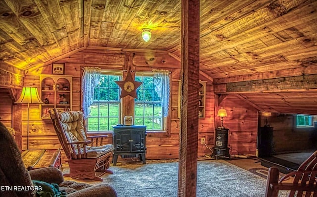 147 Akers Chapel, Jamestown, TN 38556 - sitting room featuring a wood stove, wooden ceiling, wood walls, lofted ceiling, and carpet floors