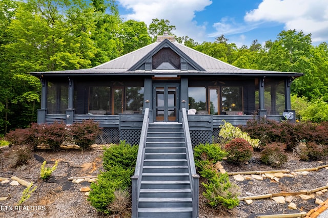 1139 Reagan Valley Rd, Tellico Plains, TN 37385 - view of front of property featuring a sunroom, stairway, a chimney, and french doors