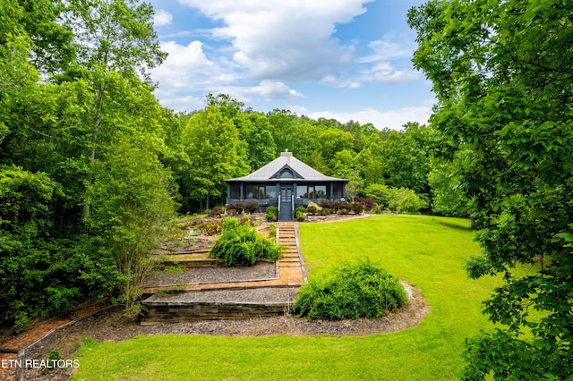 1139 Reagan Valley Rd, Tellico Plains, TN 37385 - view of green lawn featuring stairs and a forest view