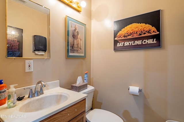 1139 Reagan Valley Rd, Tellico Plains, TN 37385 - bathroom featuring toilet and vanity