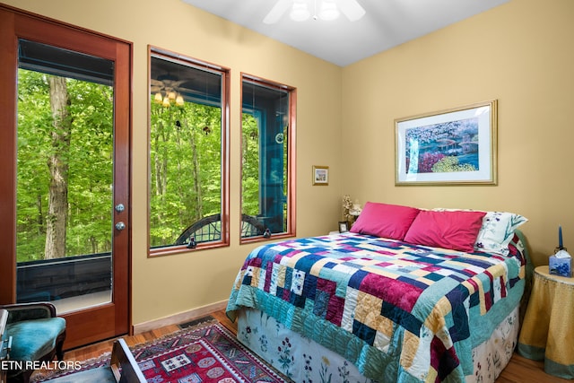 1139 Reagan Valley Rd, Tellico Plains, TN 37385 - bedroom featuring wood finished floors and a ceiling fan