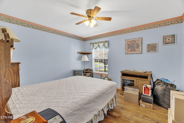1647 Sams Dr, Dandridge, TN 37725 - bedroom featuring wood finished floors and a ceiling fan