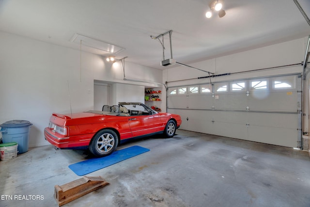 1647 Sams Dr, Dandridge, TN 37725 - garage featuring a garage door opener
