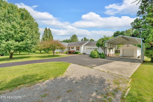 1647 Sams Dr, Dandridge, TN 37725 - single story home with a carport, a front yard, driveway, and a garage