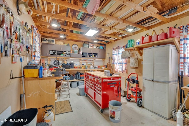 1647 Sams Dr, Dandridge, TN 37725 - misc room with a workshop area and concrete flooring