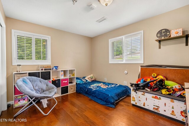 601 S Gallaher View Rd, Knoxville, TN 37919 - bedroom featuring multiple windows and wood finished floors