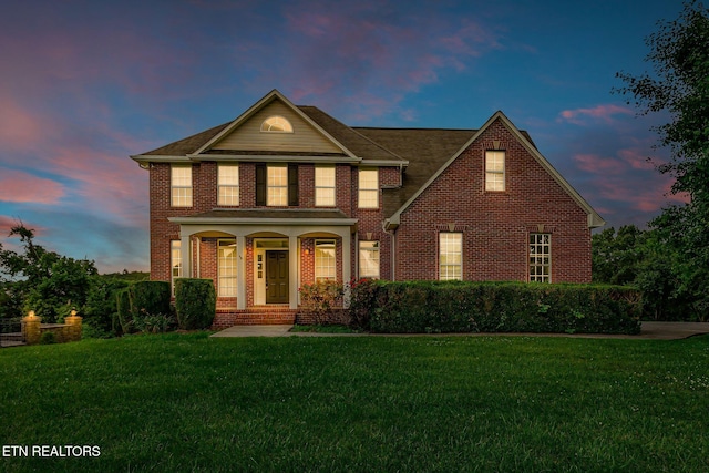 1010 Creek Brook Ln, Seymour, TN 37865 - traditional home with brick siding, a front lawn, and covered porch