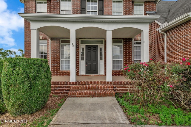 1010 Creek Brook Ln, Seymour, TN 37865 - doorway to property with brick siding and a porch