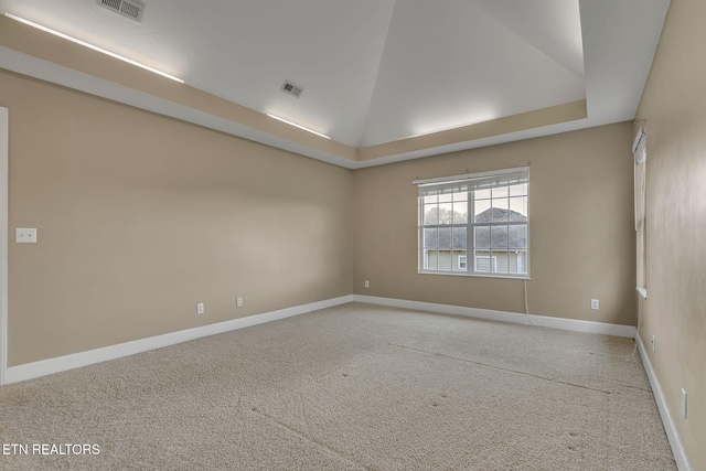 1010 Creek Brook Ln, Seymour, TN 37865 - carpeted spare room featuring lofted ceiling and a tray ceiling