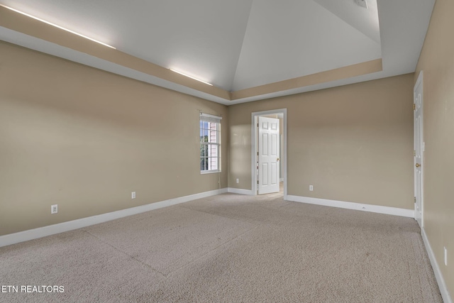 1010 Creek Brook Ln, Seymour, TN 37865 - carpeted empty room with baseboards and lofted ceiling