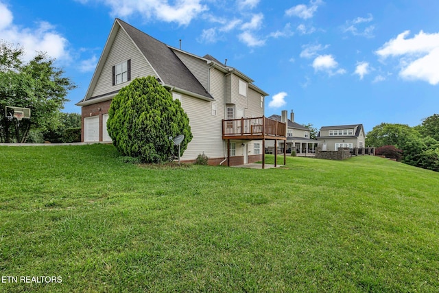 1010 Creek Brook Ln, Seymour, TN 37865 - rear view of property with a yard, a wooden deck, and an attached garage