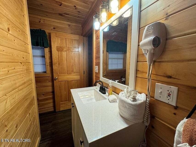 1930 Regans Ridge Way, Sevierville, TN 37876 - bathroom featuring wooden walls, vanity, wooden ceiling, and wood finished floors