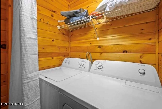 1930 Regans Ridge Way, Sevierville, TN 37876 - laundry area with washing machine and dryer and wooden walls