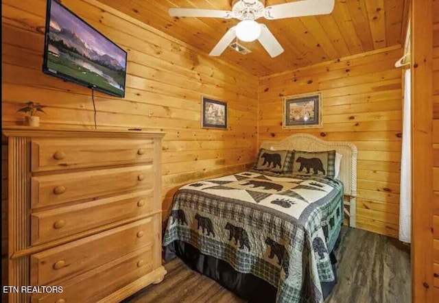 1930 Regans Ridge Way, Sevierville, TN 37876 - bedroom featuring dark wood-style flooring, wooden ceiling, wooden walls, and ceiling fan
