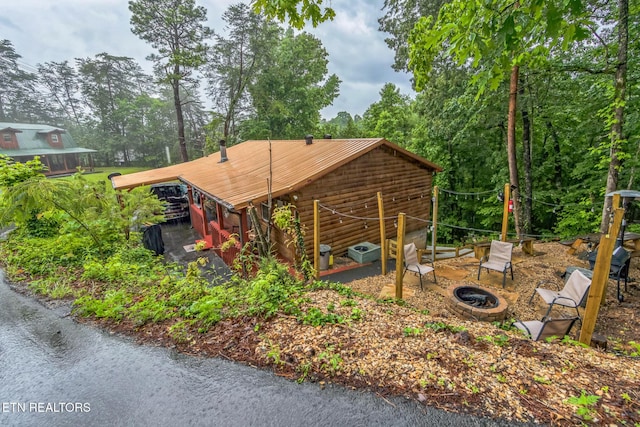 1737 Walker Trl, Sevierville, TN 37876 - view of parking / parking lot featuring an outdoor fire pit and view of scattered trees