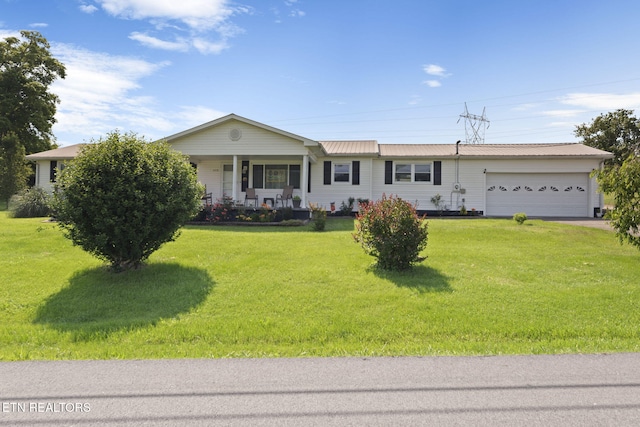 8318 Clapps Chapel Rd, Corryton, TN 37721 - ranch-style house featuring covered porch, a garage, a front lawn, and metal roof