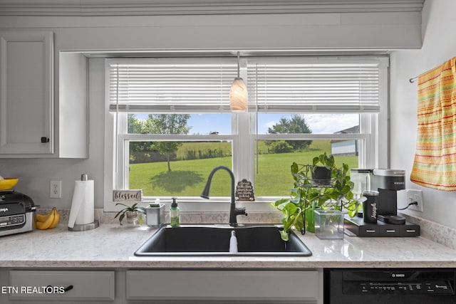 8318 Clapps Chapel Rd, Corryton, TN 37721 - kitchen with a sink, black dishwasher, and light stone counters