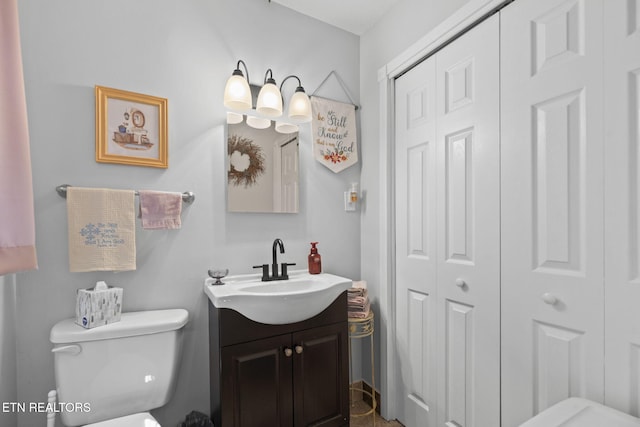 8318 Clapps Chapel Rd, Corryton, TN 37721 - bathroom with a closet, vanity, and toilet