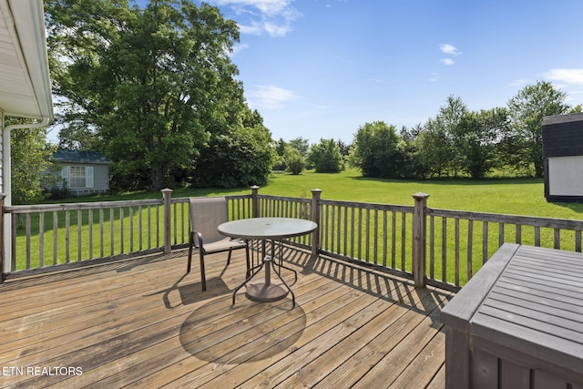 8318 Clapps Chapel Rd, Corryton, TN 37721 - deck featuring outdoor dining area, a lawn, and an outdoor structure