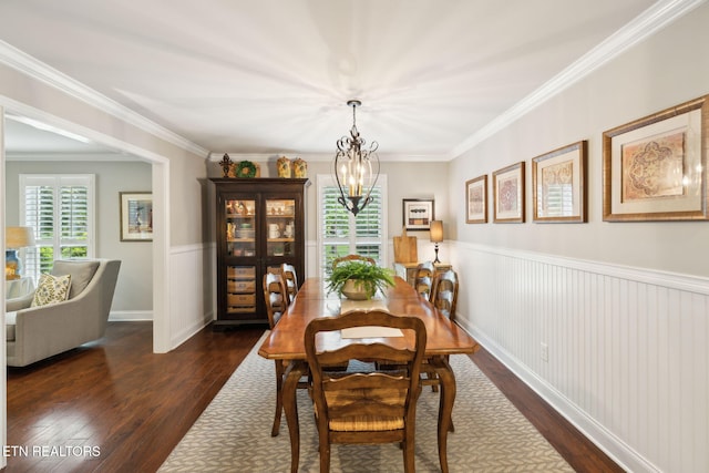 12368 N Fox Den Dr, Knoxville, TN 37934 - dining area featuring a chandelier, hardwood / wood-style flooring, a wainscoted wall, and ornamental molding