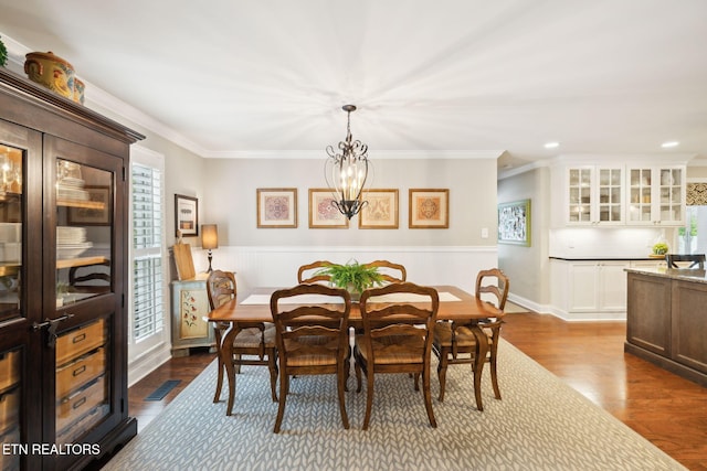 12368 N Fox Den Dr, Knoxville, TN 37934 - dining room featuring dark wood finished floors, crown molding, a wainscoted wall, and recessed lighting