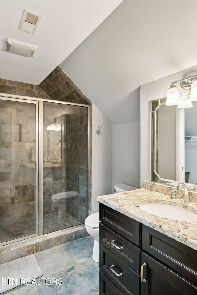 12368 N Fox Den Dr, Knoxville, TN 37934 - full bath with toilet, vanity, a shower stall, and vaulted ceiling