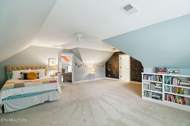 12368 N Fox Den Dr, Knoxville, TN 37934 - carpeted bedroom with vaulted ceiling and baseboards