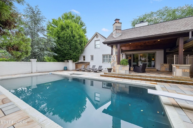 12368 N Fox Den Dr, Knoxville, TN 37934 - view of swimming pool with a patio area and a diving board