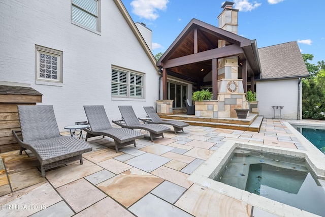 12368 N Fox Den Dr, Knoxville, TN 37934 - back of house featuring a patio, a chimney, an in-ground hot tub, and an outdoor pool