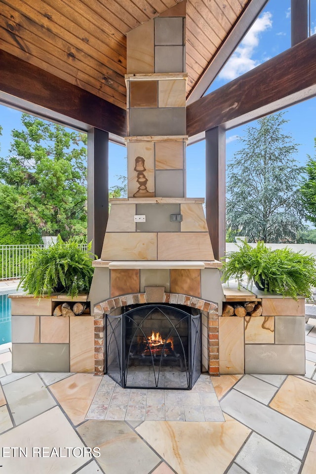 12368 N Fox Den Dr, Knoxville, TN 37934 - view of patio featuring a warm lit fireplace