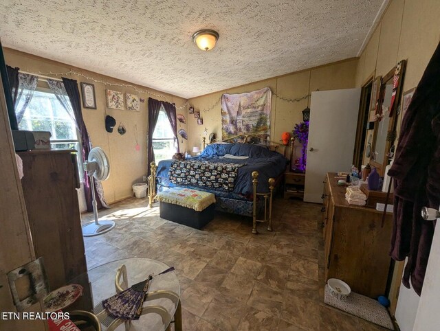 626 S 22nd St, Middlesboro, KY 40965 - bedroom with a textured ceiling and multiple windows