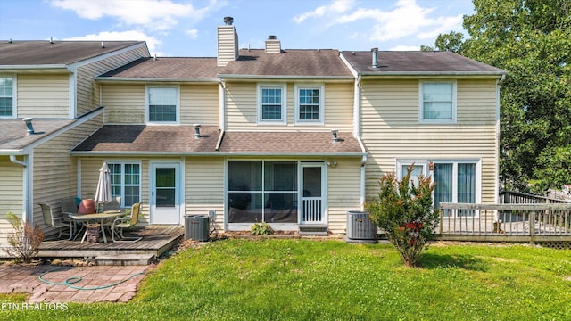 613 Vose Rd Unit B, Alcoa, TN 37701 - rear view of property featuring a wooden deck, a chimney, a yard, and central air condition unit