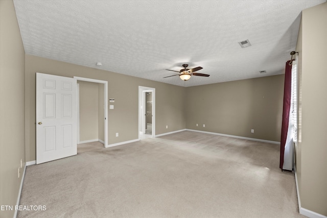 7127 Fieldstone Farms Ln, Knoxville, TN 37921 - empty room with ceiling fan, light carpet, baseboards, and a textured ceiling