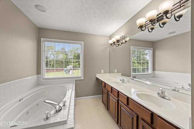 7127 Fieldstone Farms Ln, Knoxville, TN 37921 - full bath with a jetted tub, double vanity, baseboards, and a textured ceiling