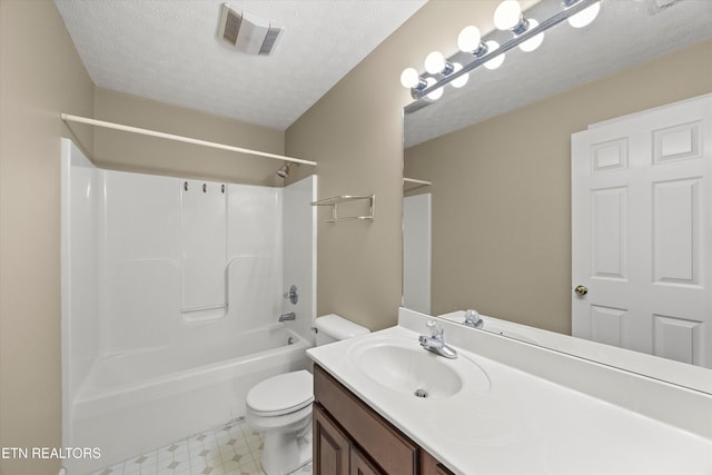 7127 Fieldstone Farms Ln, Knoxville, TN 37921 - bathroom featuring toilet, vanity, tile patterned floors, tub / shower combination, and a textured ceiling