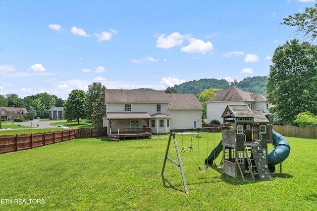 7127 Fieldstone Farms Ln, Knoxville, TN 37921 - back of house featuring a playground and a deck