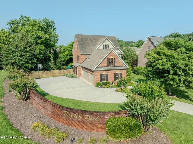 1201 Bentley Park Ln, Knoxville, TN 37922 - view of front of house featuring driveway and brick siding