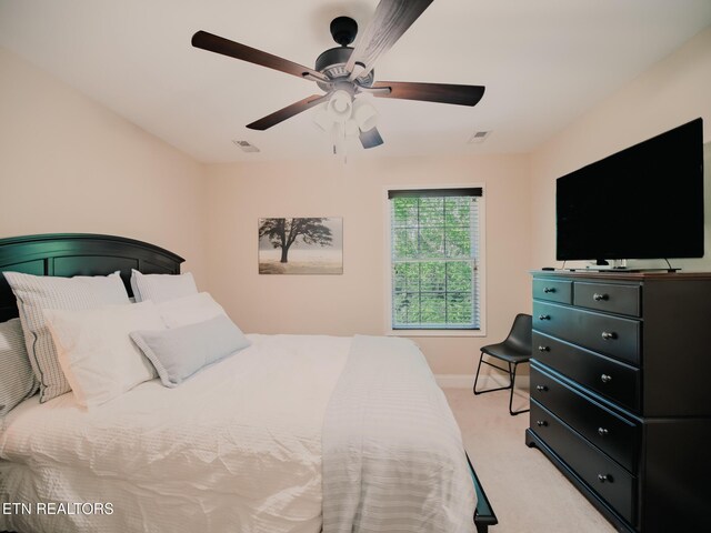 1201 Bentley Park Ln, Knoxville, TN 37922 - bedroom featuring light colored carpet, baseboards, and a ceiling fan
