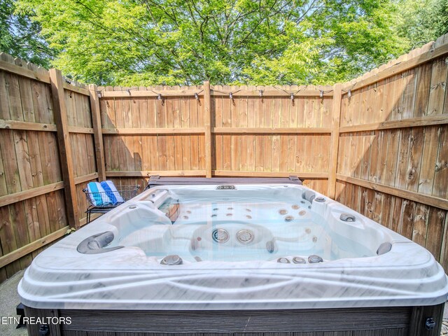 1201 Bentley Park Ln, Knoxville, TN 37922 - view of patio featuring a hot tub