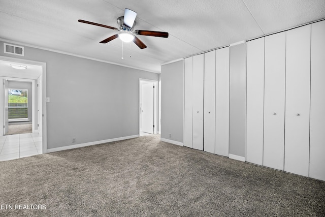 467 Canberra Dr Unit B103, Knoxville, TN 37923 - unfurnished bedroom featuring carpet, two closets, baseboards, ceiling fan, and a textured ceiling
